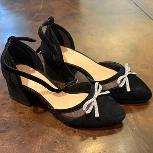 Elegant Black Heels with Bow Accent